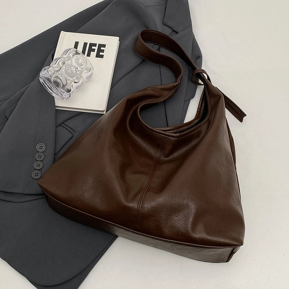 Women's Vintage Shoulder Tote Bag with large capacity, premium PU leather, zipper closure, and elegant everyday design