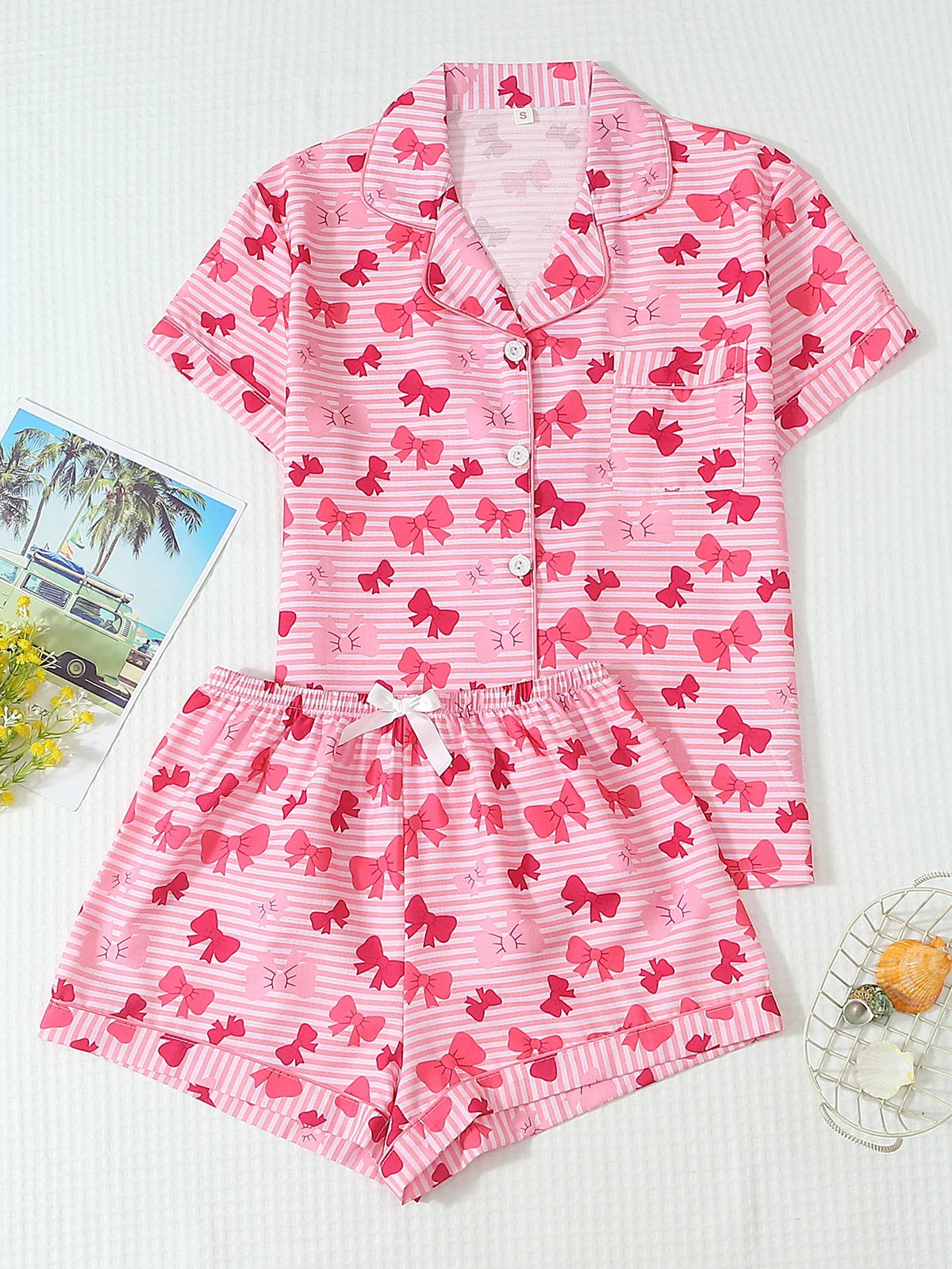 Two-Piece Set: Comfortable Pink and White Striped Top with Red Bow Print, Turn-Down Collar, Buttoned Short Sleeves, and Pockets, Paired with Bow Shorts. Spring/Summer Women's Pajama Loungewear Set Suitable for Home Use