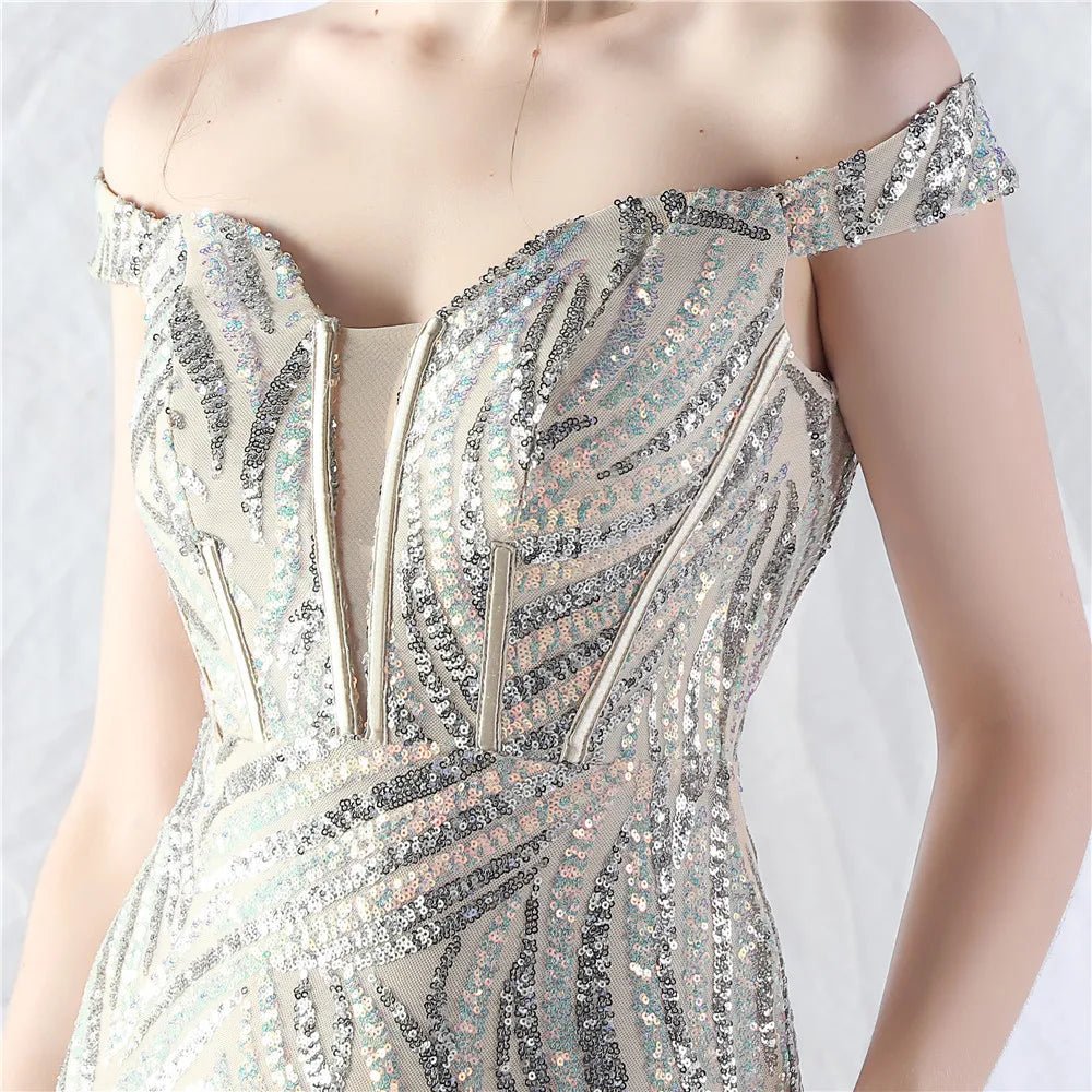 Women's Sequin Formal Evening Gown with strapless neckline and sparkling sequin design for weddings and parties