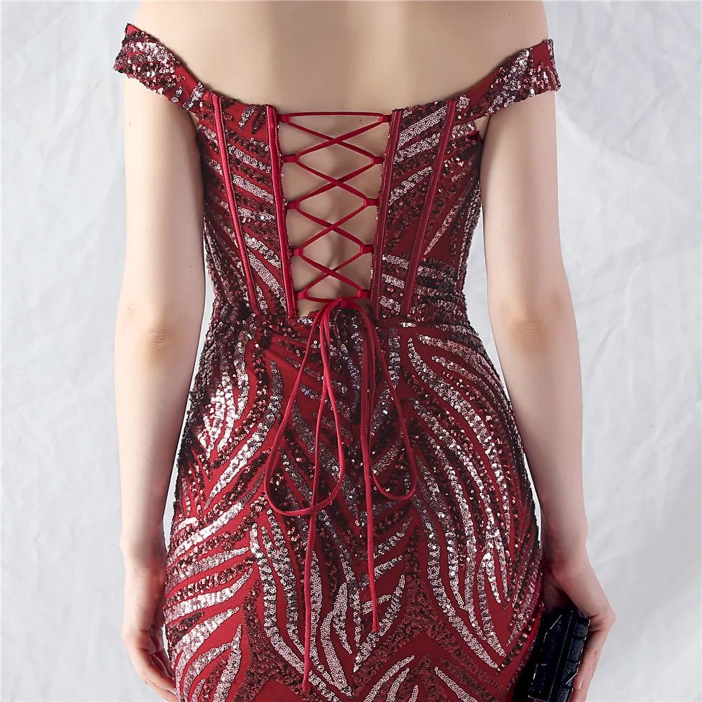 Women's Sequin Formal Evening Gown with strapless neckline and sparkling sequin design for weddings and parties