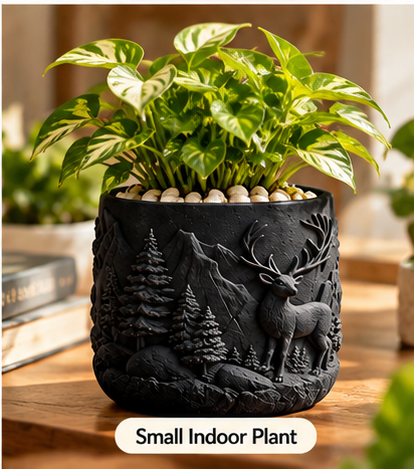 Small embossed flower pot used for a small indoor plant